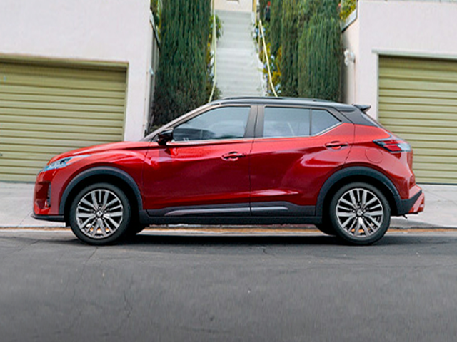 Profile view of a red 2024 Nissan Kicks | Nissan dealer in Chesapeake, VA | Banister Nissan of Chesapeake
